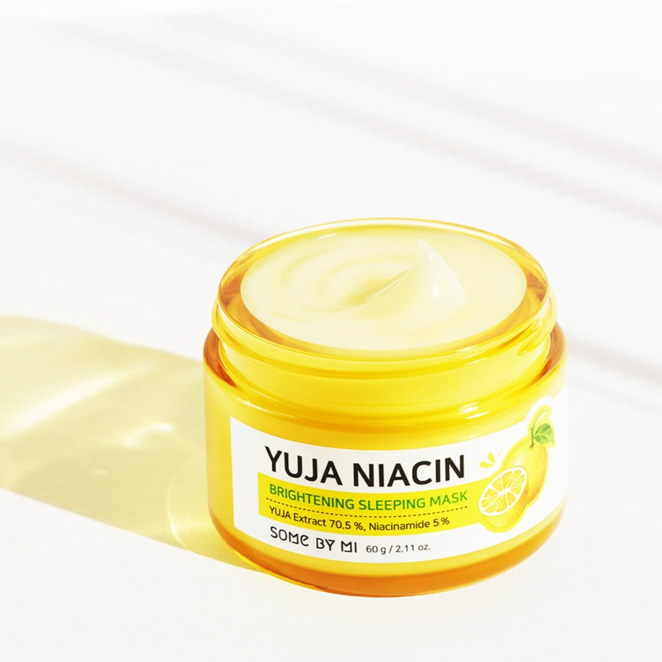 Some By Mi Yuja Niacin Brightening Sleeping Mask in a 60g jar, featuring brightening skincare ingredients and a smooth, creamy texture.