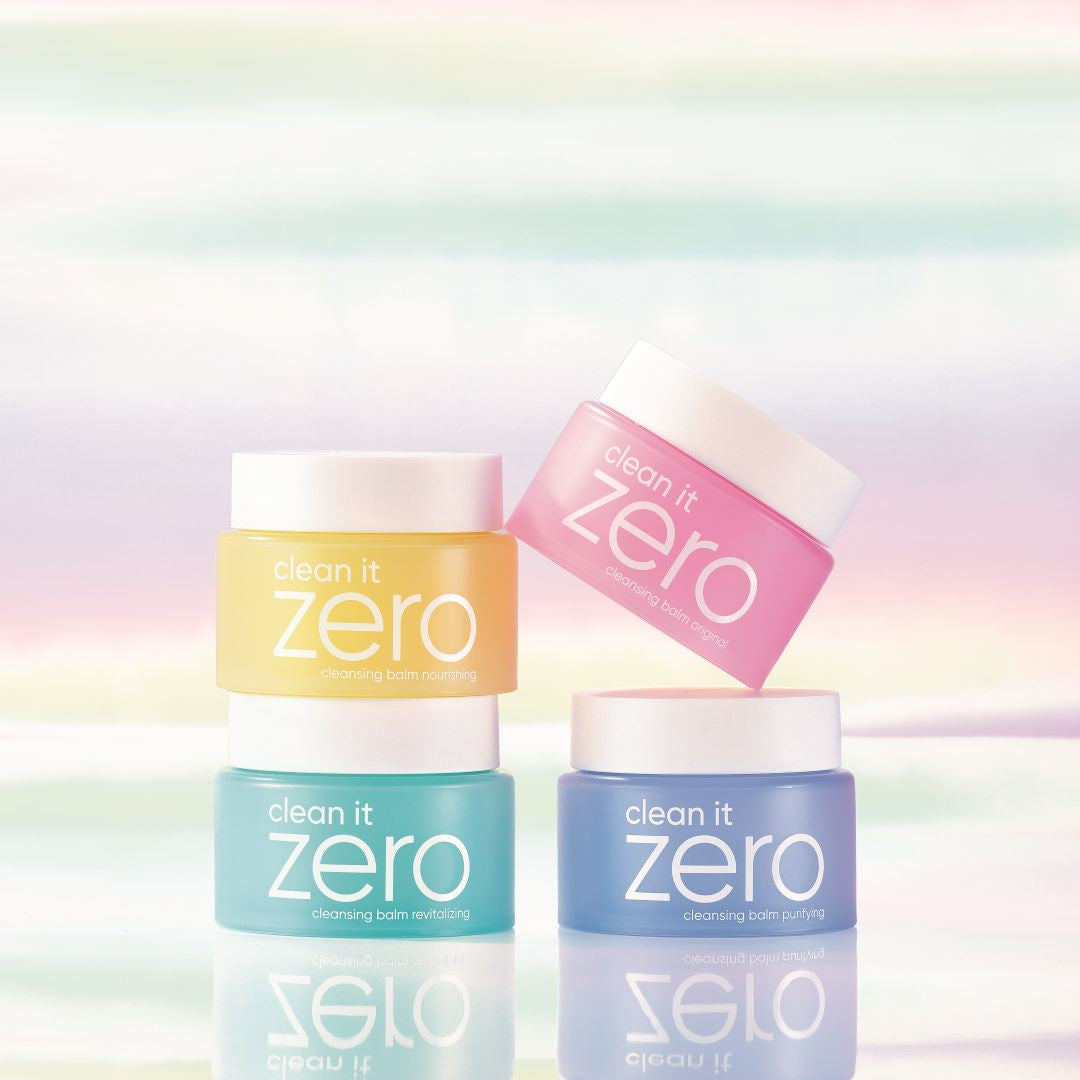 Banila Co Clean It Zero Cleansing Balm Miniature Set with four oil and balm cleansers in small containers, showcasing different types.