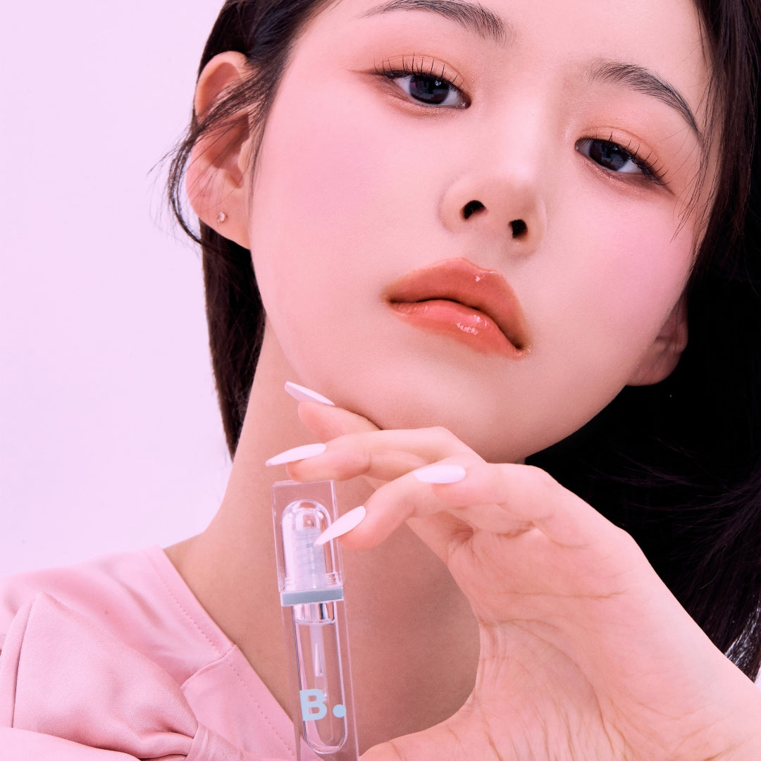 Banila Co B. By Banila Volume Lip Plumper Maxi showing a sleek tube with the lip plumper product inside