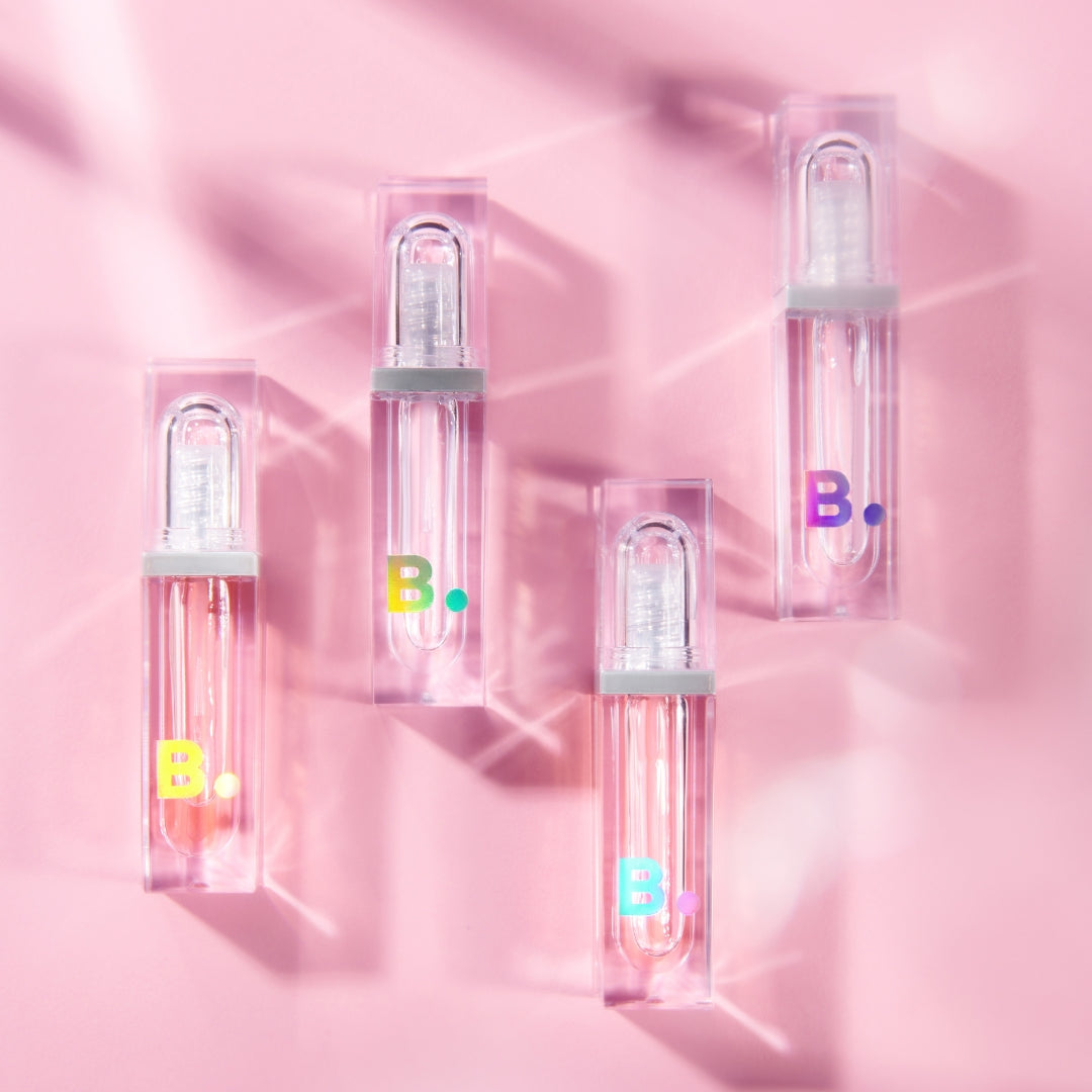 Banila Co B. By Banila Volume Lip Plumper Maxi showing a close-up of the plumper tube and applicator.