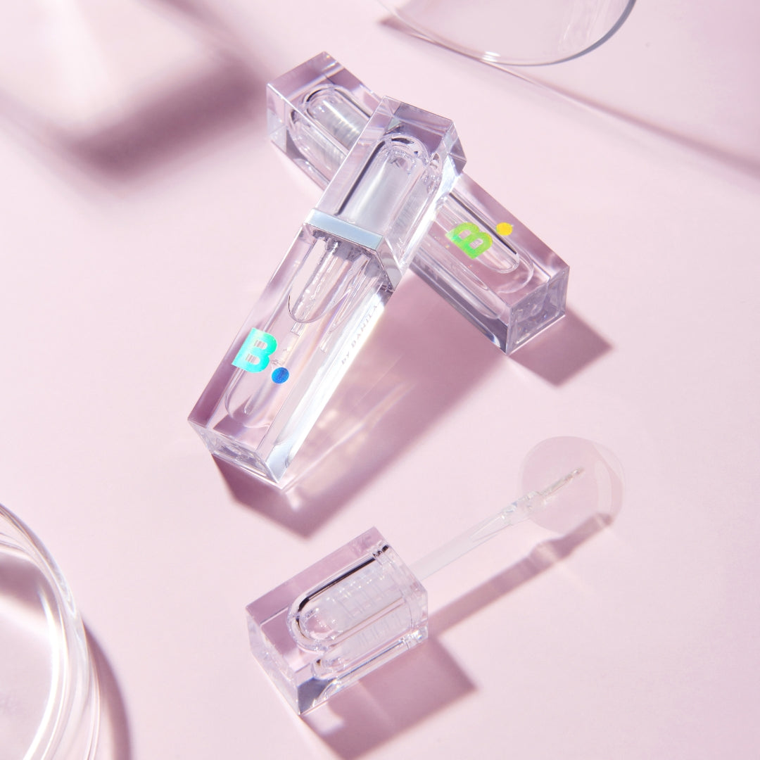 Banila Co B. By Banila Volume Lip Plumper Maxi showing a sleek tube with the lip plumper applicator for fuller lips.