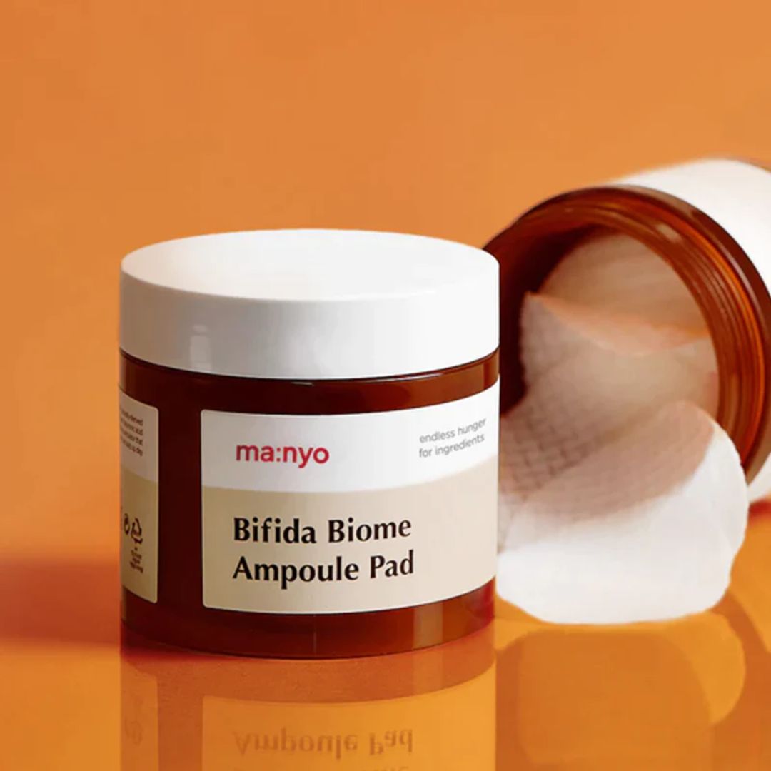 Ma:nyo Bifida Biome Ampoule Pad toner pad with 70 sheets, showing textured cotton pads for nourishing skincare application.