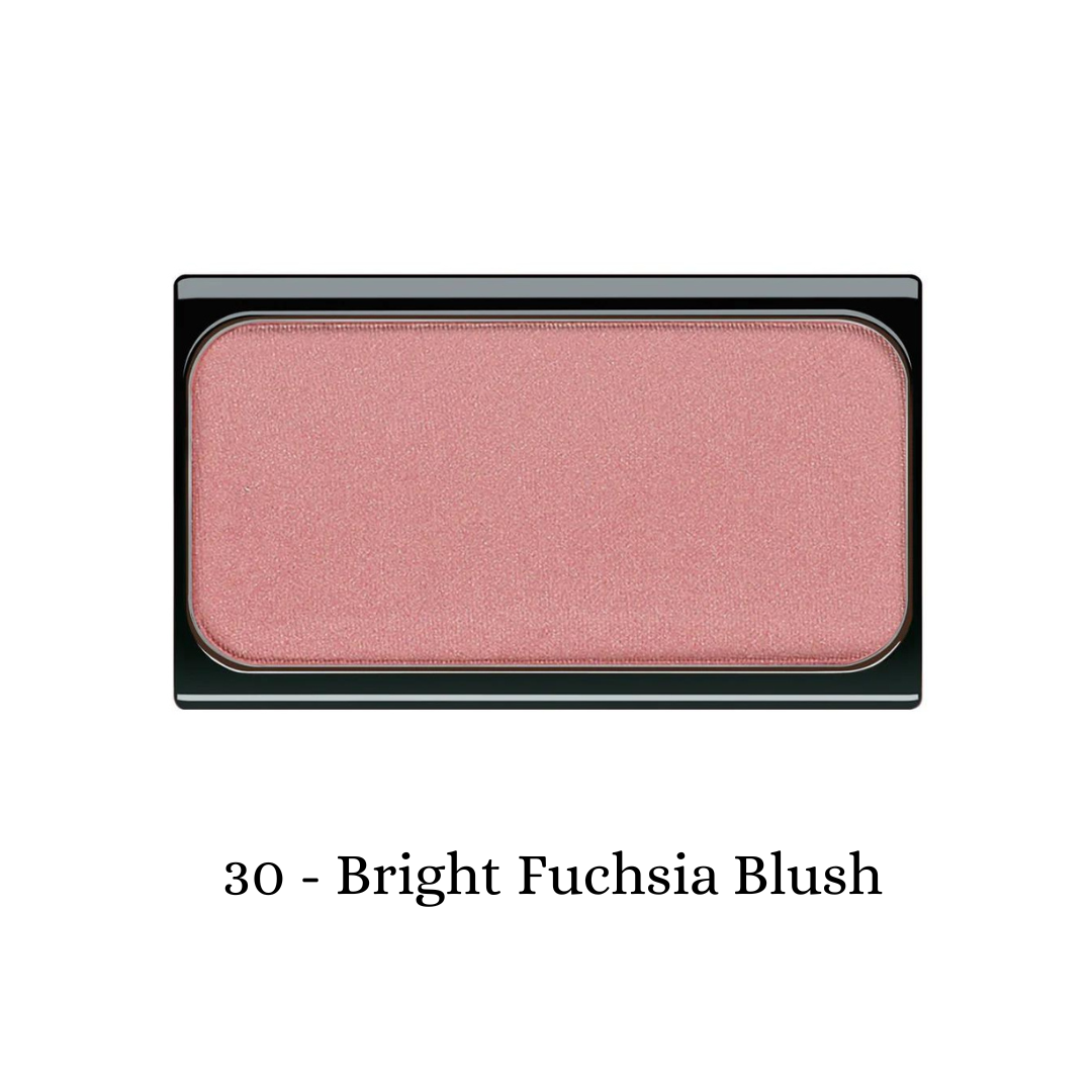 Bright fuchsia ARTDECO blush compact with smooth powder texture and rounded shape, showcasing vibrant color for cheeks.