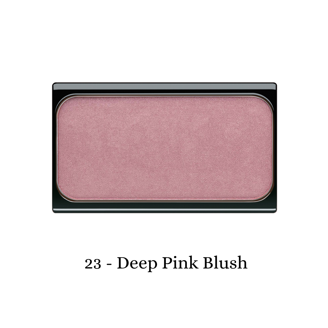 Deep pink ARTDECO blush in a round compact, showcasing smooth powder texture and vibrant color for a natural rosy glow.