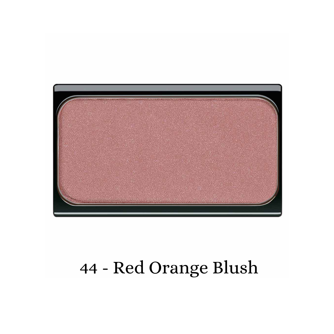 ARTDECO blush in vibrant red-orange shade, showing a smooth, rounded powder blush compact with a soft, matte finish.