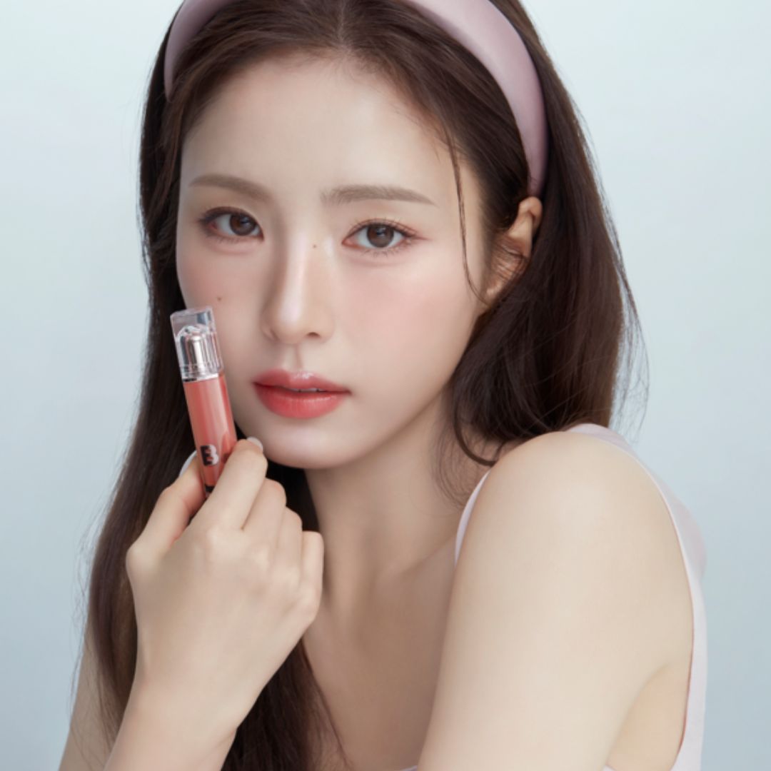 Banila Co Dew Glow Lip Tint in a sleek tube, showcasing a vibrant, glossy lip tint with a dewy finish.