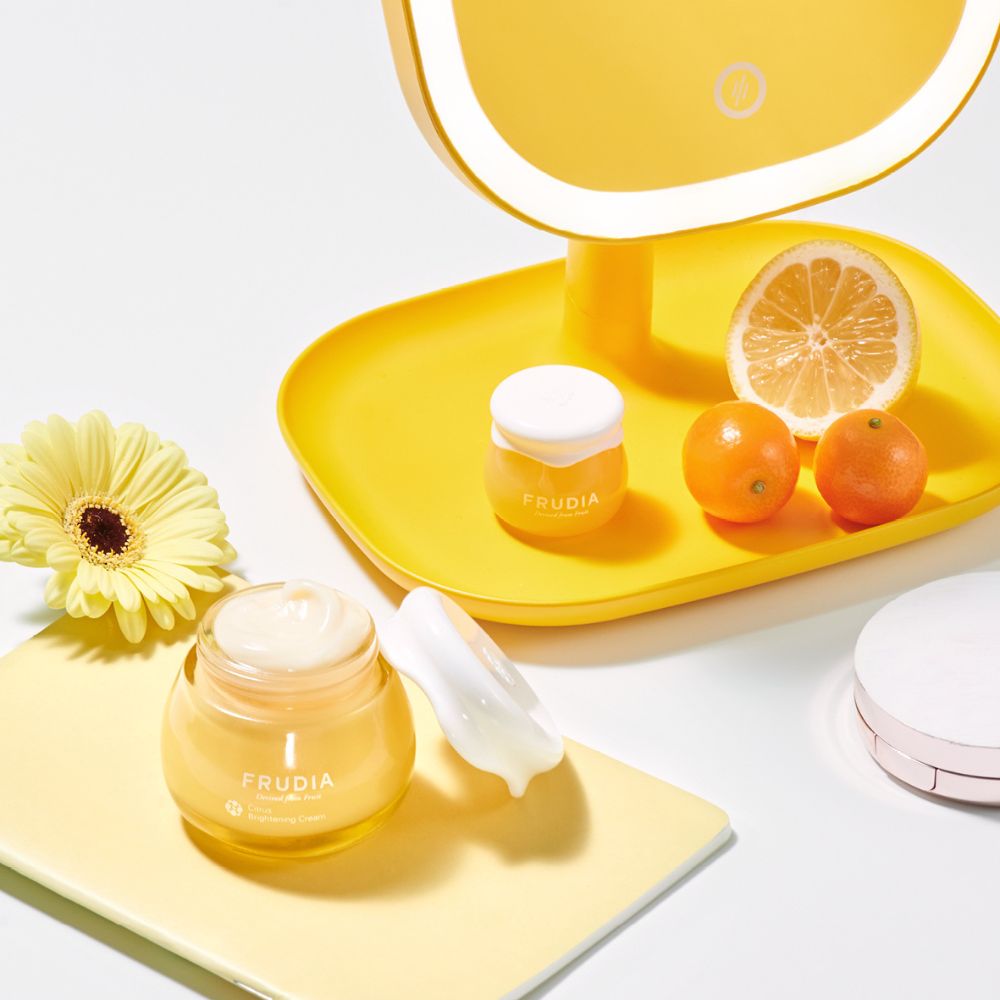 Frudia Citrus Brightening Cream face moisturizer with citrus extract, smooth texture, and hydrating formula for glowing skin.