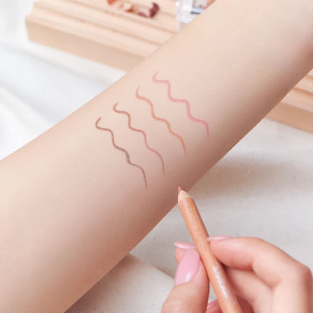 Clio Velvet Lip Pencil Set featuring multiple lip liner pencils in vibrant shades, displayed on a neutral background.