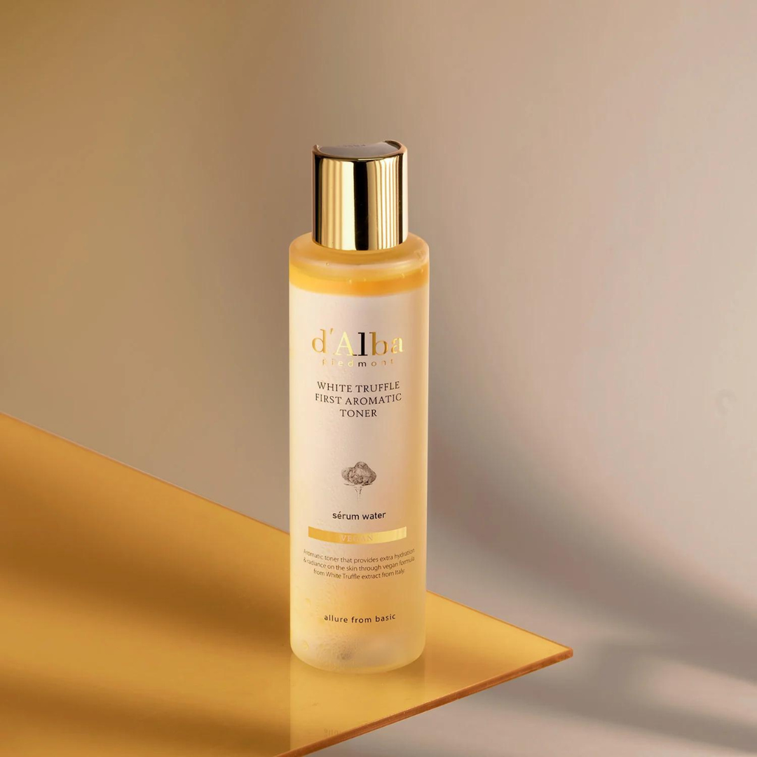 d'Alba White Truffle First Aromatic Toner in a clear 115ml bottle, showcasing its elegant packaging and label design.
