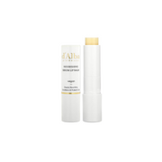 White Truffle Nourishing Lip Balm by d'Alba, 3.6g, in a sleek white tube with a twist-up applicator, showcasing its smooth texture.
