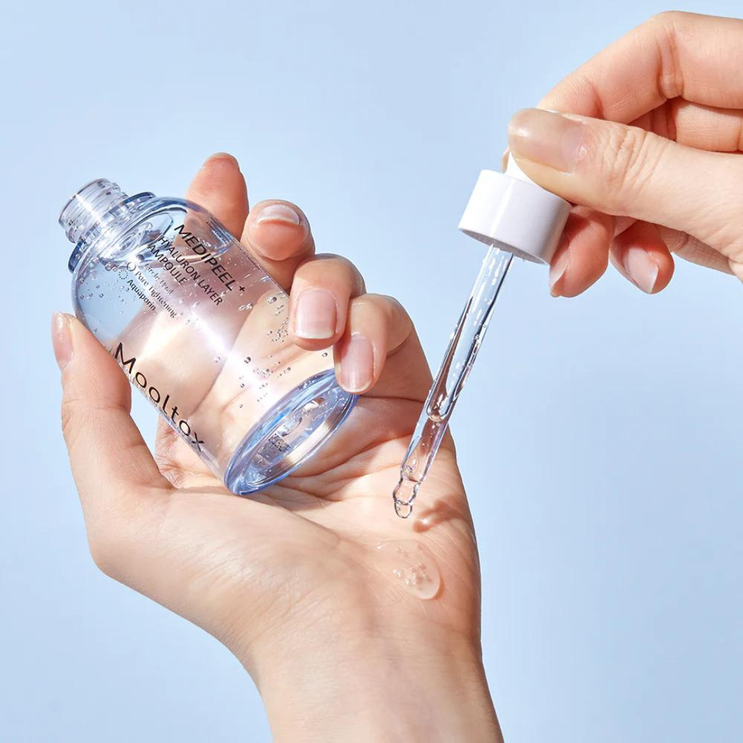 Medipeel Hyaluronic Acid Layer Mooltox Ampoule 30ml, clear glass bottle with dropper for deep hydration and skin plumping.