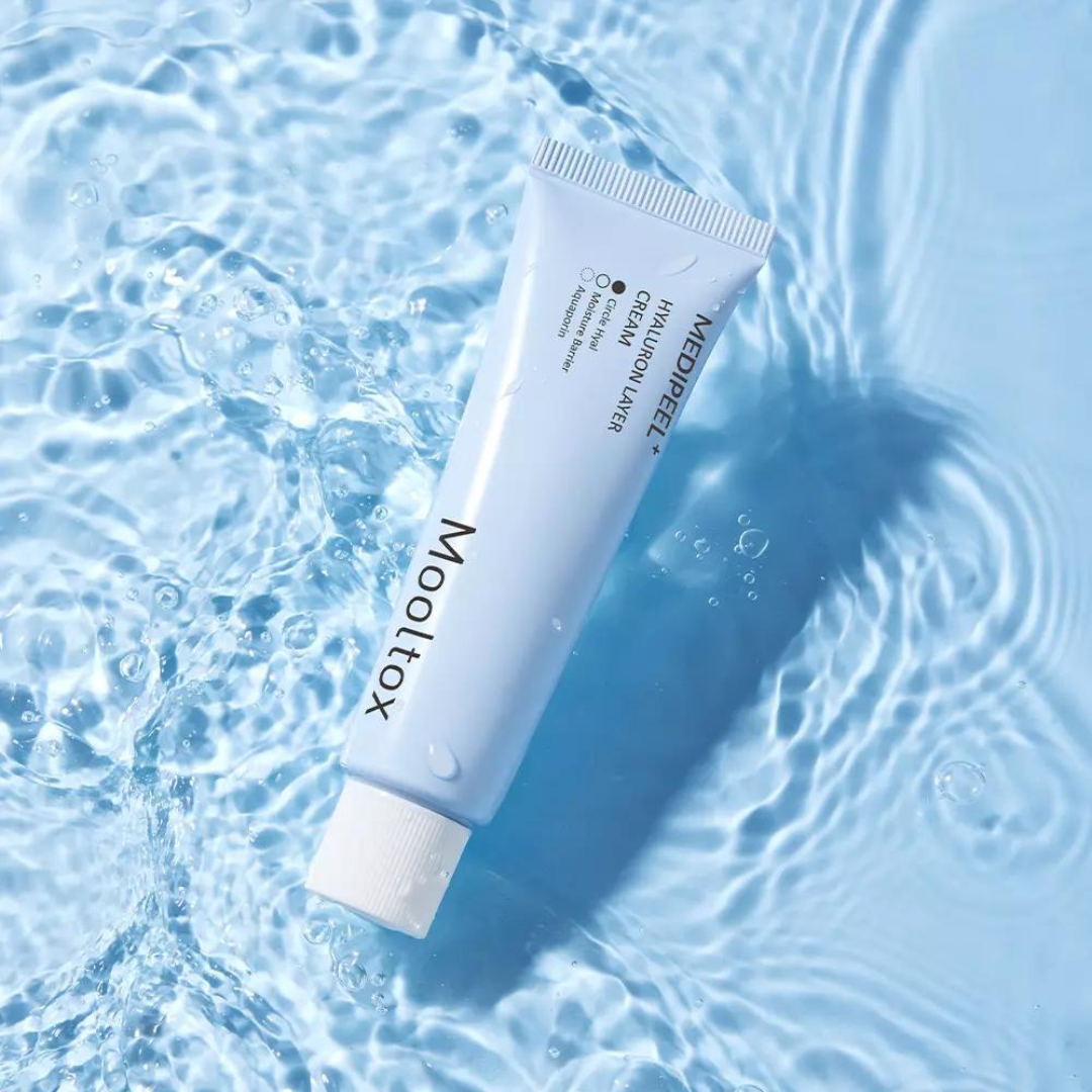 Medipeel+ Hyaluronic Acid Layer Mooltox Face Moisturiser jar showing cream texture and white packaging.