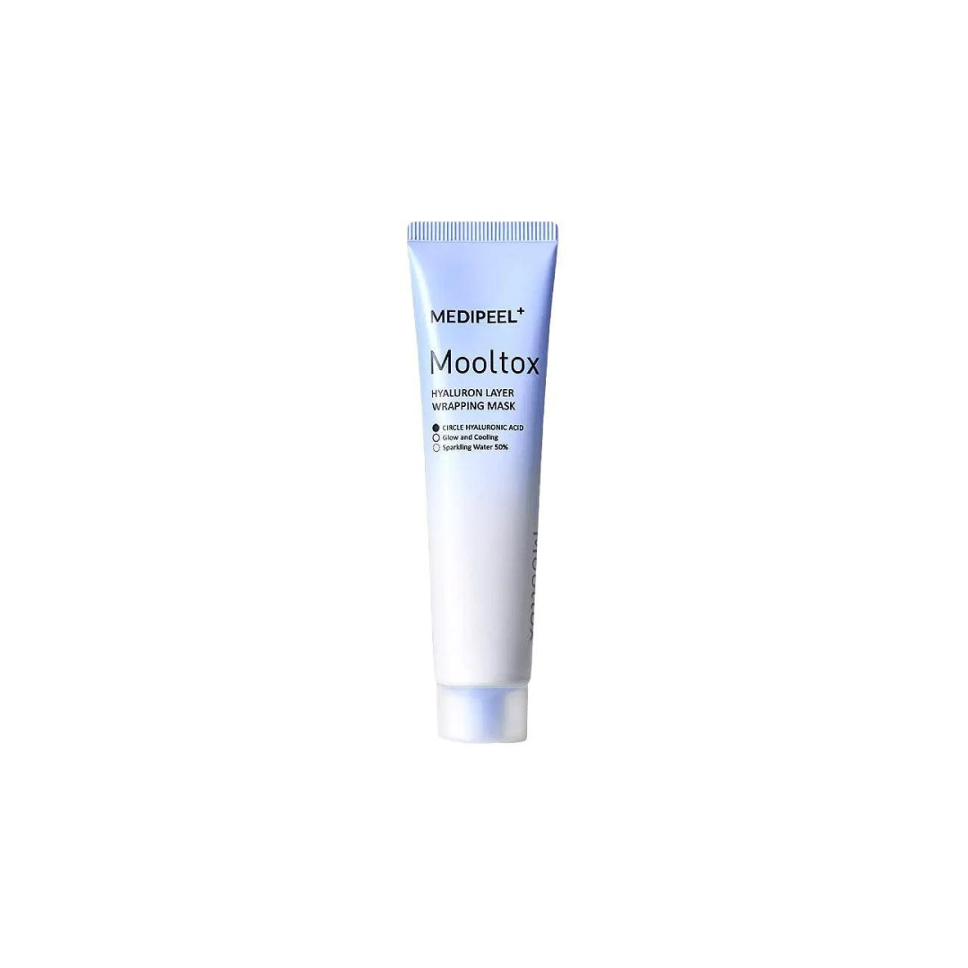 Medipeel Hyaluronic Acid Layer Mooltox Wrapping Mask in a 70ml jar, showing the smooth, hydrating wash-off mask with a white and blue design.