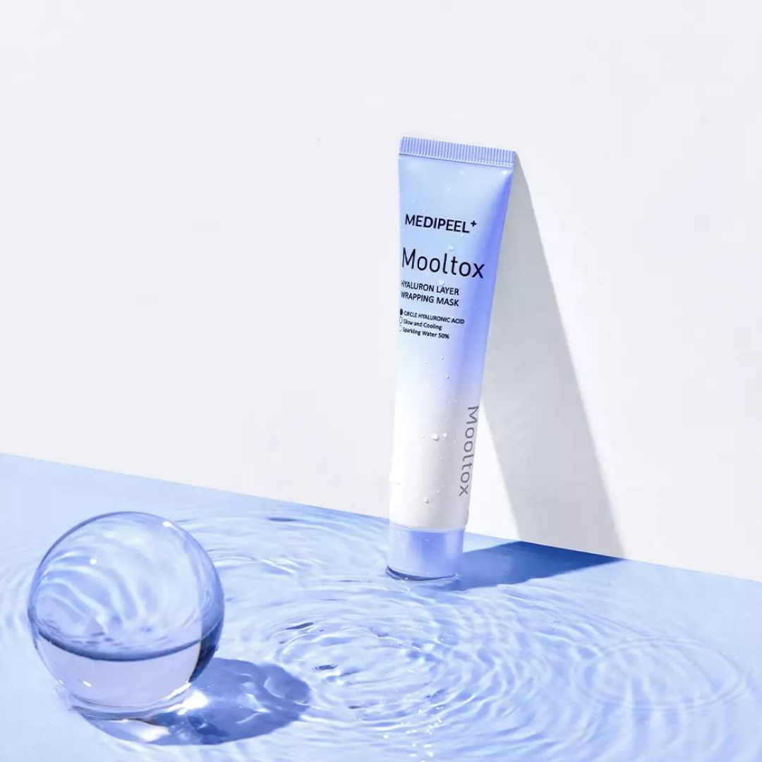 MEDIPEEL+ Hyaluronic Acid Layer Mooltox Wash-off Mask in 70ml jar with creamy, hydrating texture and blue and white packaging.
