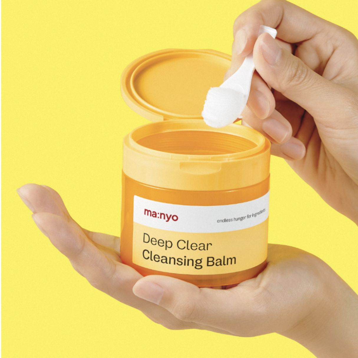 Ma:nyo Deep Clear Cleansing Balm 132ml in a jar, showing the oil and balm texture for face cleansing.