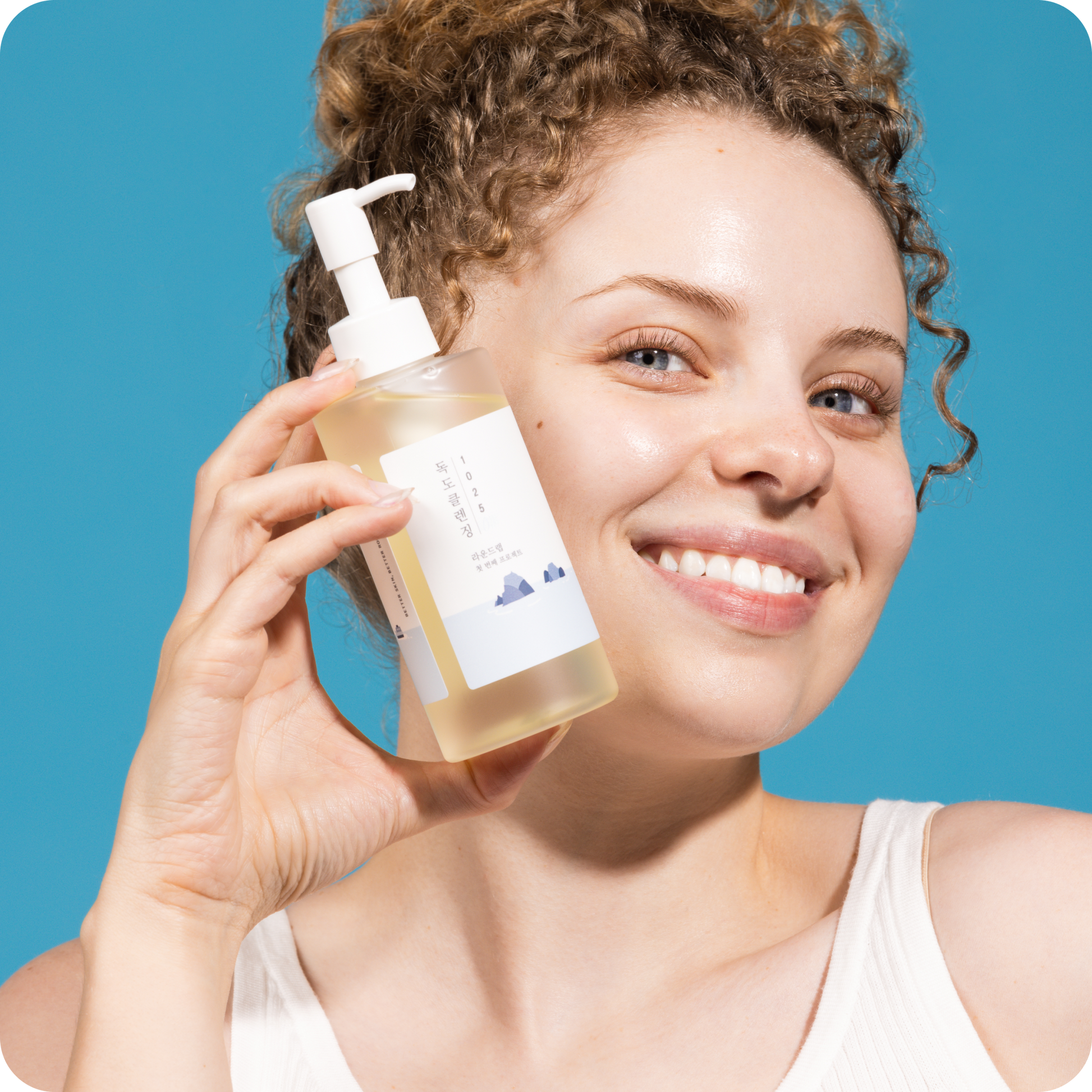 Round Lab Dokdo Cleansing Oil 200ml, gentle oil cleanser with a clear bottle and pump dispenser, for removing makeup and impurities.