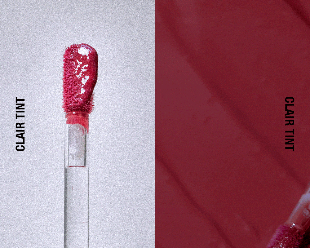 Too Cool For School Artclass Clair Tint lip tint in a sleek tube, showcasing its vibrant color and stylish packaging.