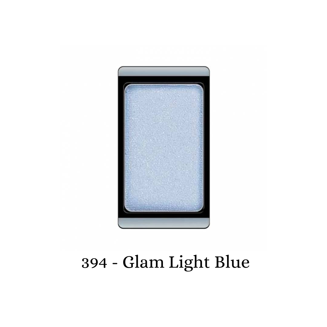 ARTDECO Eyeshadow Glam in Glam Light Blue with shimmering finish, showcasing vibrant blue eyeshadow on a neutral background.