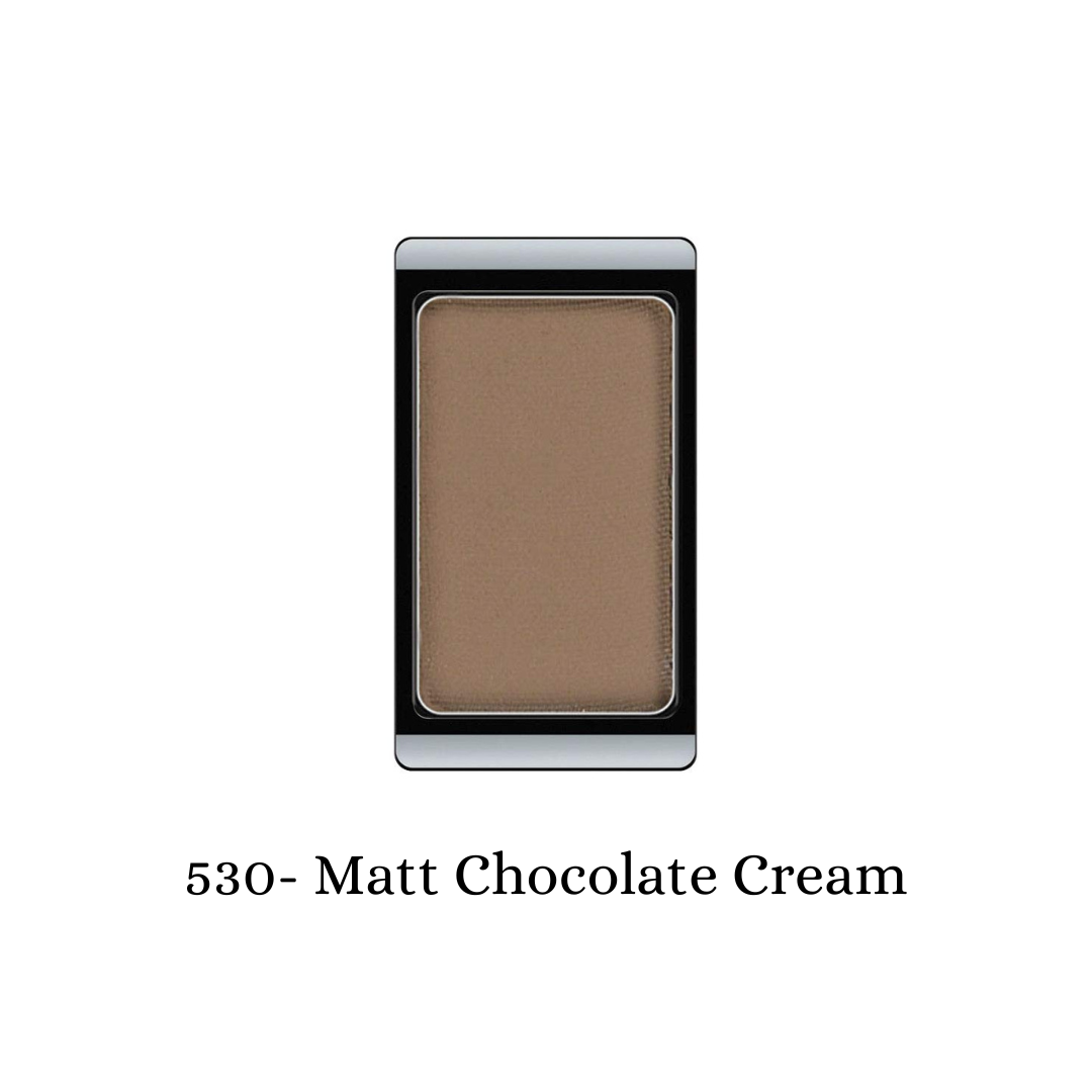 ARTDECO matte eyeshadow in chocolate cream shade, showcasing a smooth, velvety texture in a close-up image.