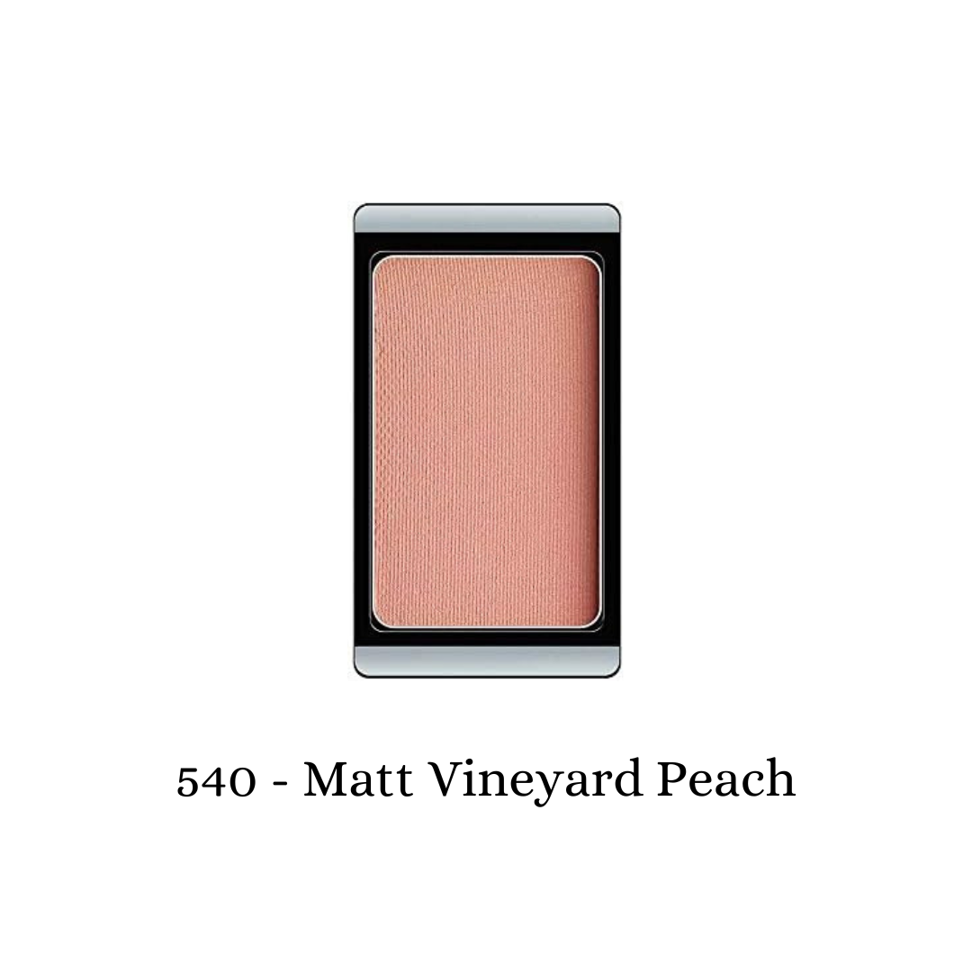 ARTDECO matte eyeshadow in Vineyard Peach, showing a soft, warm peach shade with a smooth, velvety texture.