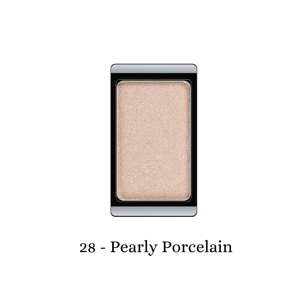 ARTDECO eyeshadow pearl in pearly porcelain shade, showcasing a shimmering, smooth eyeshadow pan with a reflective finish.