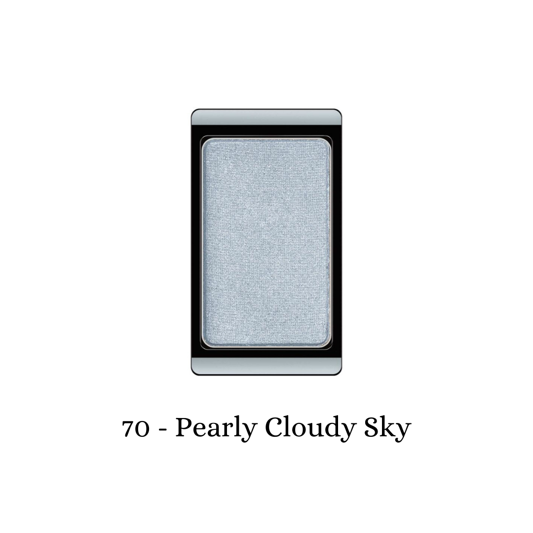 ARTDECO eyeshadow with a pearly, cloudy sky-inspired finish, showcasing a shimmering, light-colored eyeshadow in a sleek compact.