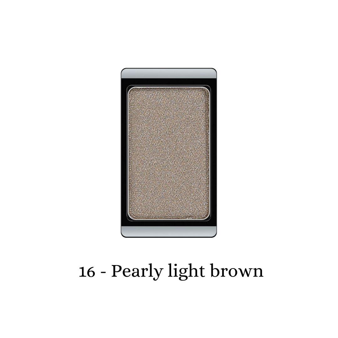 ARTDECO eyeshadow pearl in a light brown, shimmery shade, showcasing its smooth, luminous texture and compact design.
