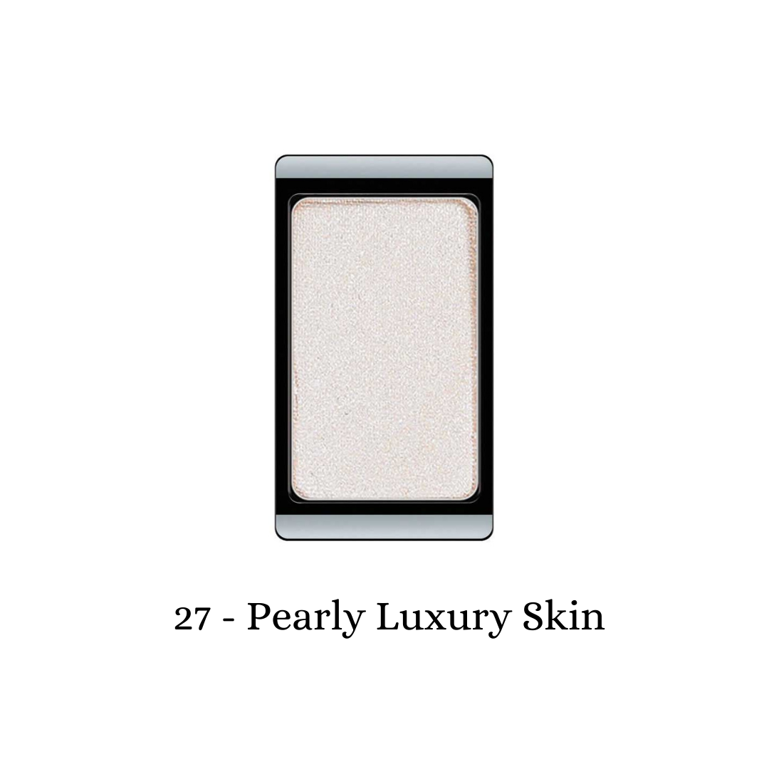 ARTDECO eyeshadow pearl with a lustrous, pearly finish displayed on a sleek makeup palette.