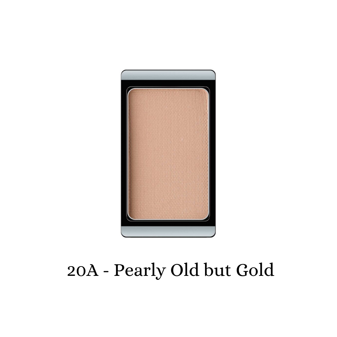ARTDECO eyeshadow pearl with a shiny, pearly gold finish, showcasing a smooth, blendable eyeshadow product in a close-up image.