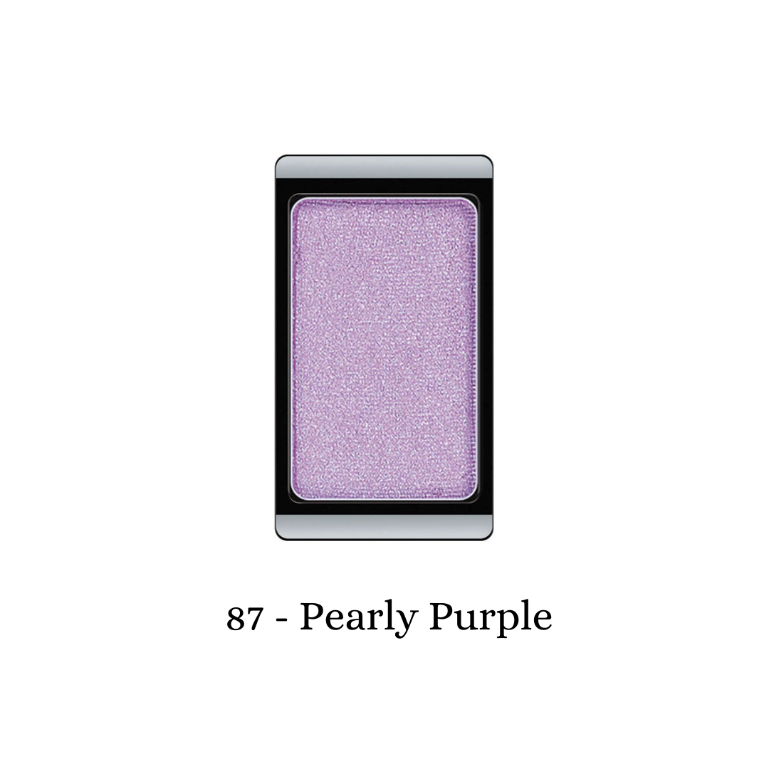 ARTDECO eyeshadow pearl in a pearly purple shade, showcasing the smooth, shimmery eyeshadow product with a close-up view.