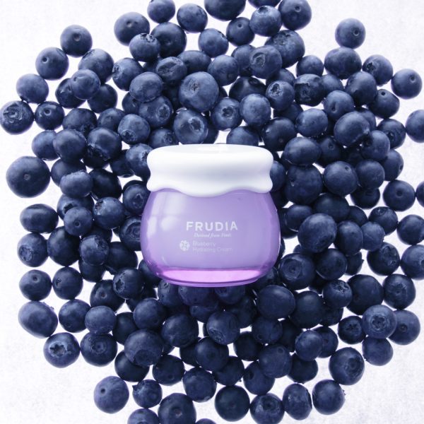 Frudia Blueberry Hydrating Cream in a 55g jar, creamy face moisturizer with fresh blueberry scent and hydrating texture.