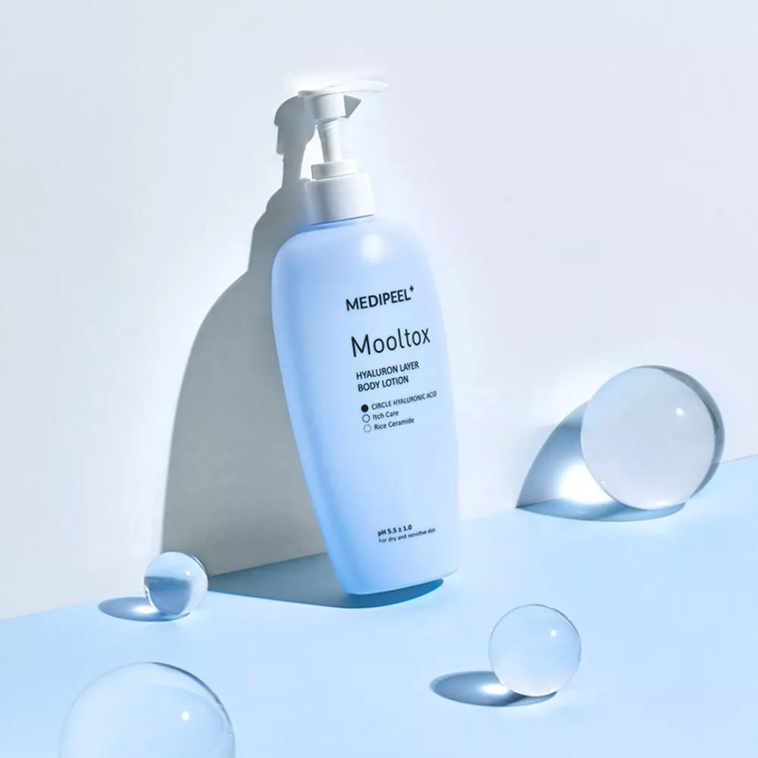 Mooltox Body Lotion with hyaluronic acid by MEDIPEEL+ in a 400ml pump bottle, smooth and hydrating skin care product.