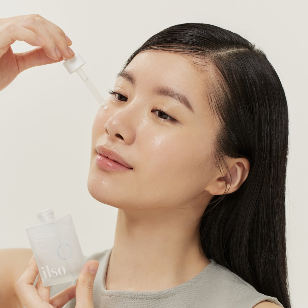 ILSO Moringa Tightening Pore Serum 30ml bottle with dropper, showcasing clear glass packaging and product label.