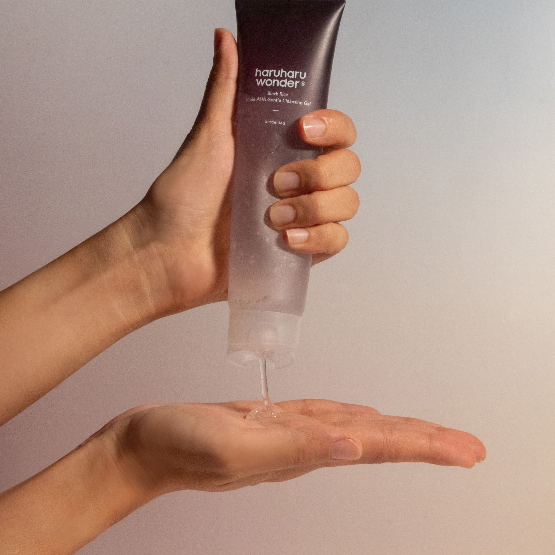Haruharu Wonder Black Rice Triple AHA Gentle Cleansing Gel in a 100ml tube, showing the white gel formula and clean packaging.