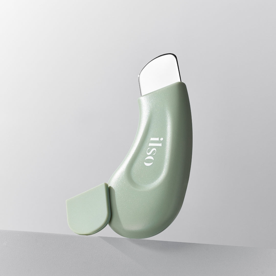 ILSO Deep Clean Master beauty tool with multiple attachments for facial cleansing and skin exfoliation.