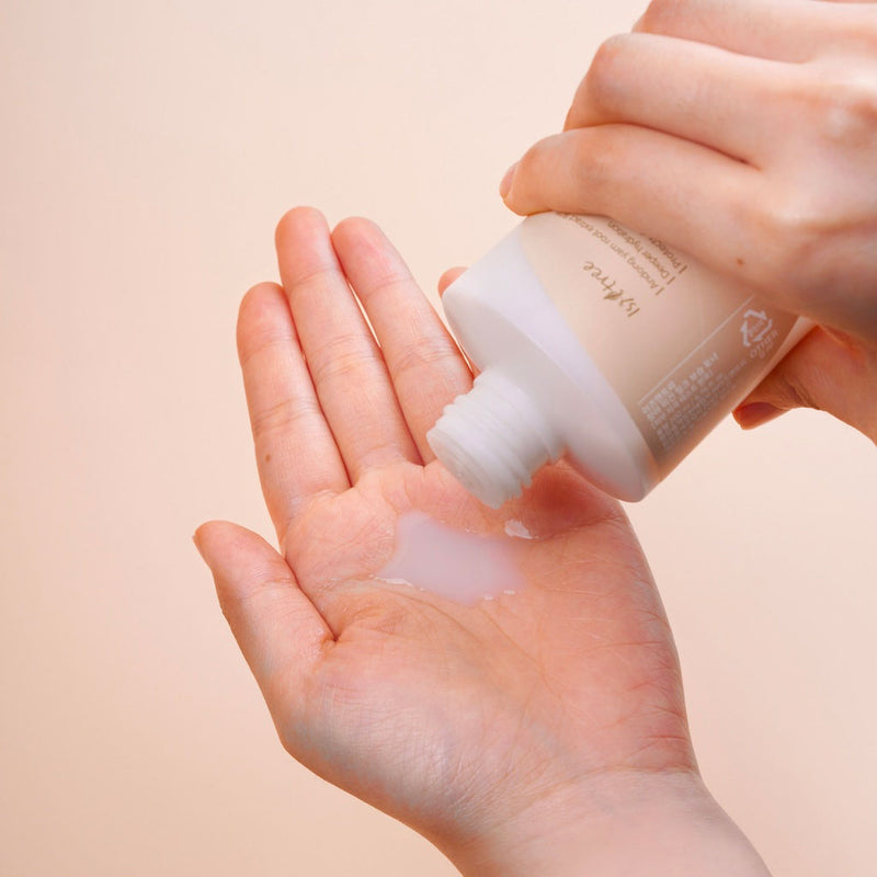 Isntree Yam Root Vegan Milk Toner in 200ml bottle, featuring a soft, milky appearance with natural ingredients for skincare.