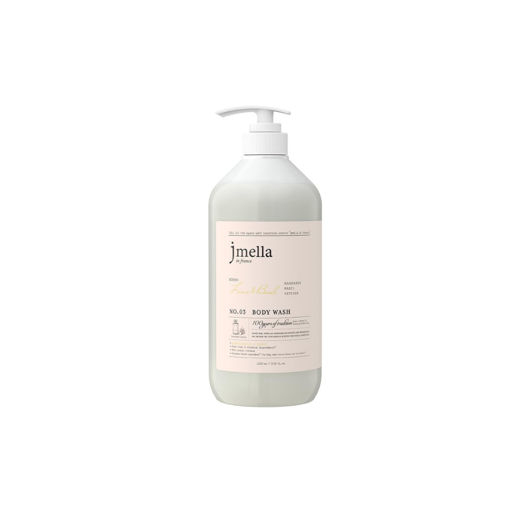 Jmella France Lime and Basil body wash and scrub with fresh citrus and herbal scent, featuring a pump dispenser and textured exfoliating surface.