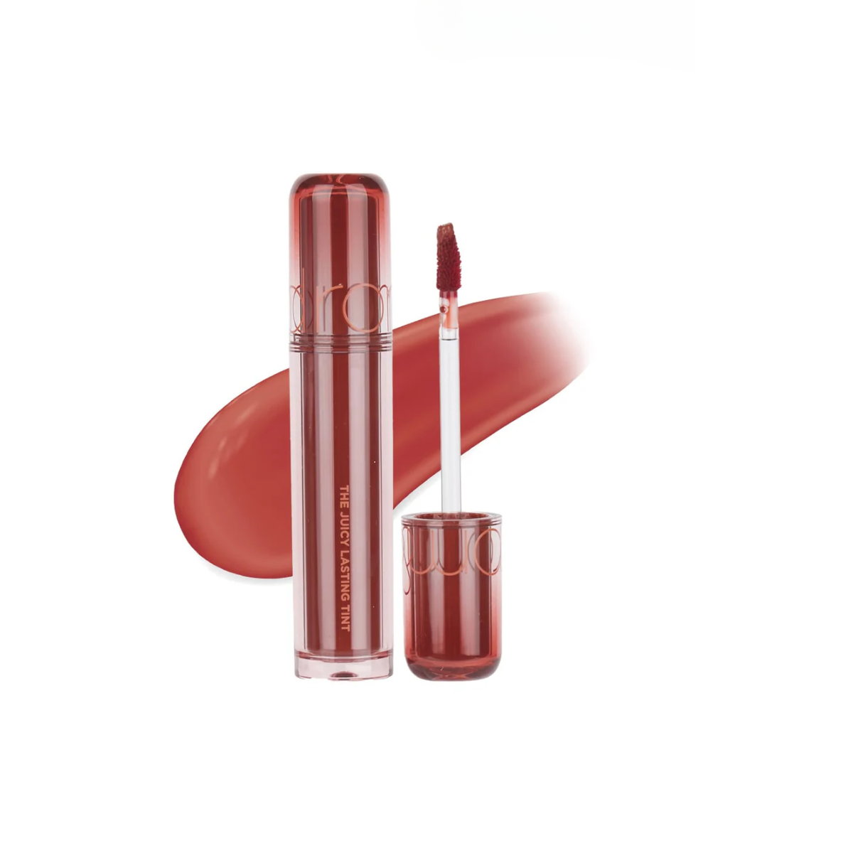 Rom&nd The Juicy Lasting Tint lip tint in vibrant coral shade, showcasing a close-up of the product tube and applicator.