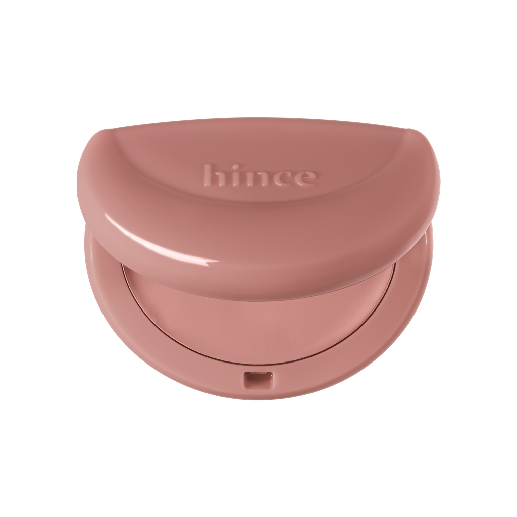 Hince Half-Moon Cheek Cream to Powder Blush in a compact with soft pink blush visible on a natural makeup look