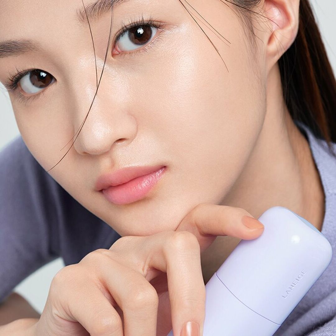 Laneige Skin Veil Base No.40 Pure Violet face primer in a 30ml bottle, showing the purple-tinted primer for even skin tone.