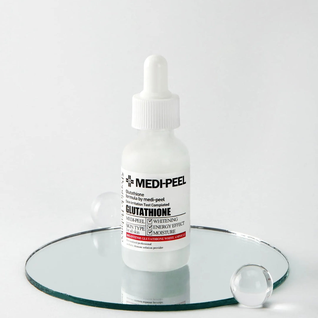 MEDI-PEEL Bio Intense Glutathione White Ampoule 30ml, clear glass ampoule with white liquid inside, for skin brightening and antioxidant benefits.