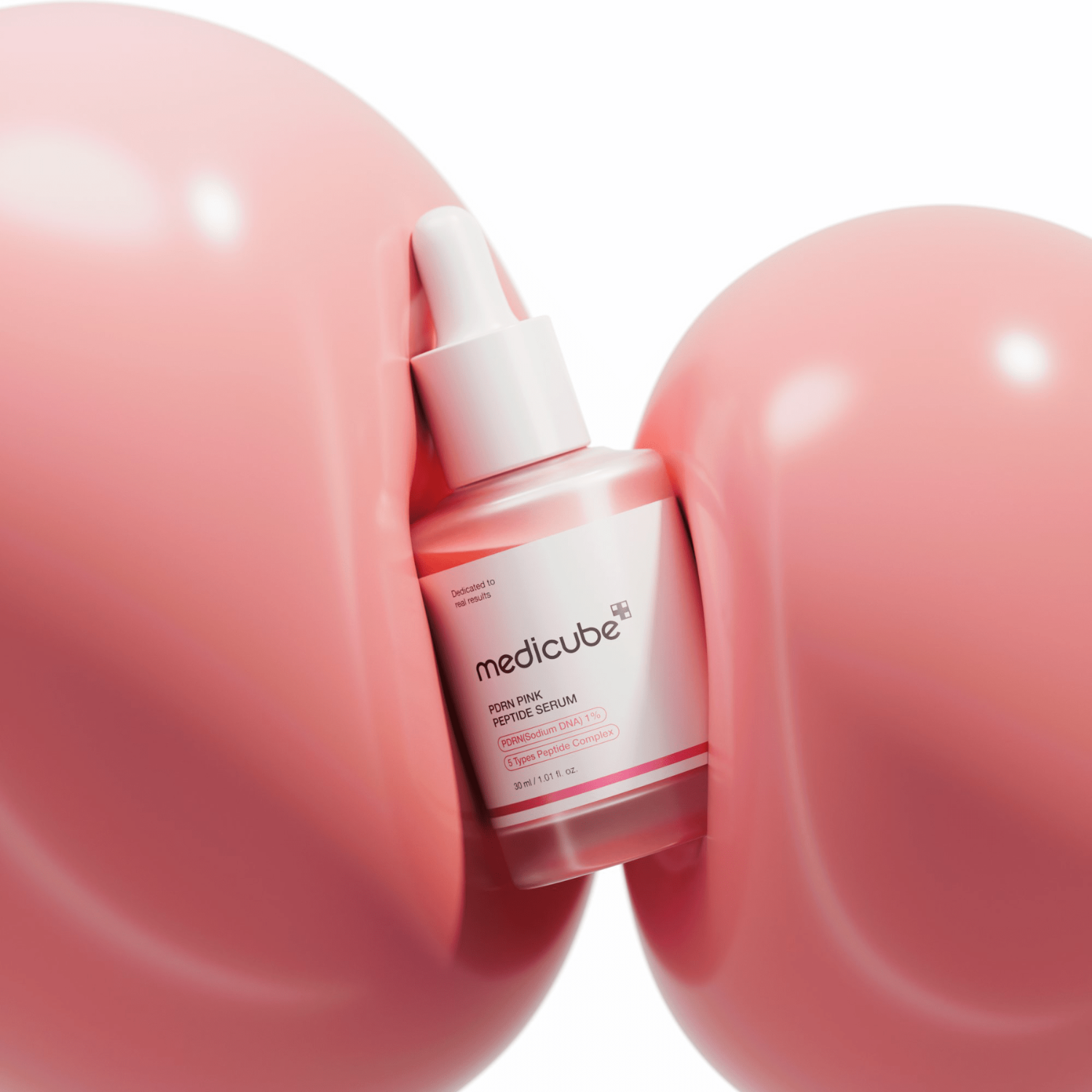 Medicube PDRN Pink Peptide Serum 30ml bottle with a sleek pink and white design, featuring a pump dispenser.