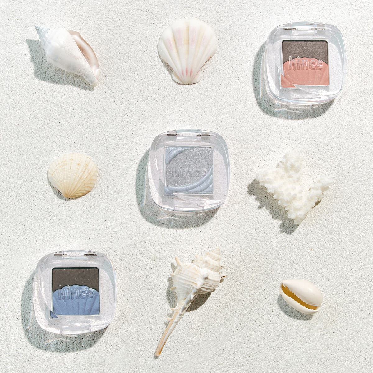 Hince Chill Voyage Edition single eyeshadow in soft, shimmery neutral shade, displayed in a compact on a white background.