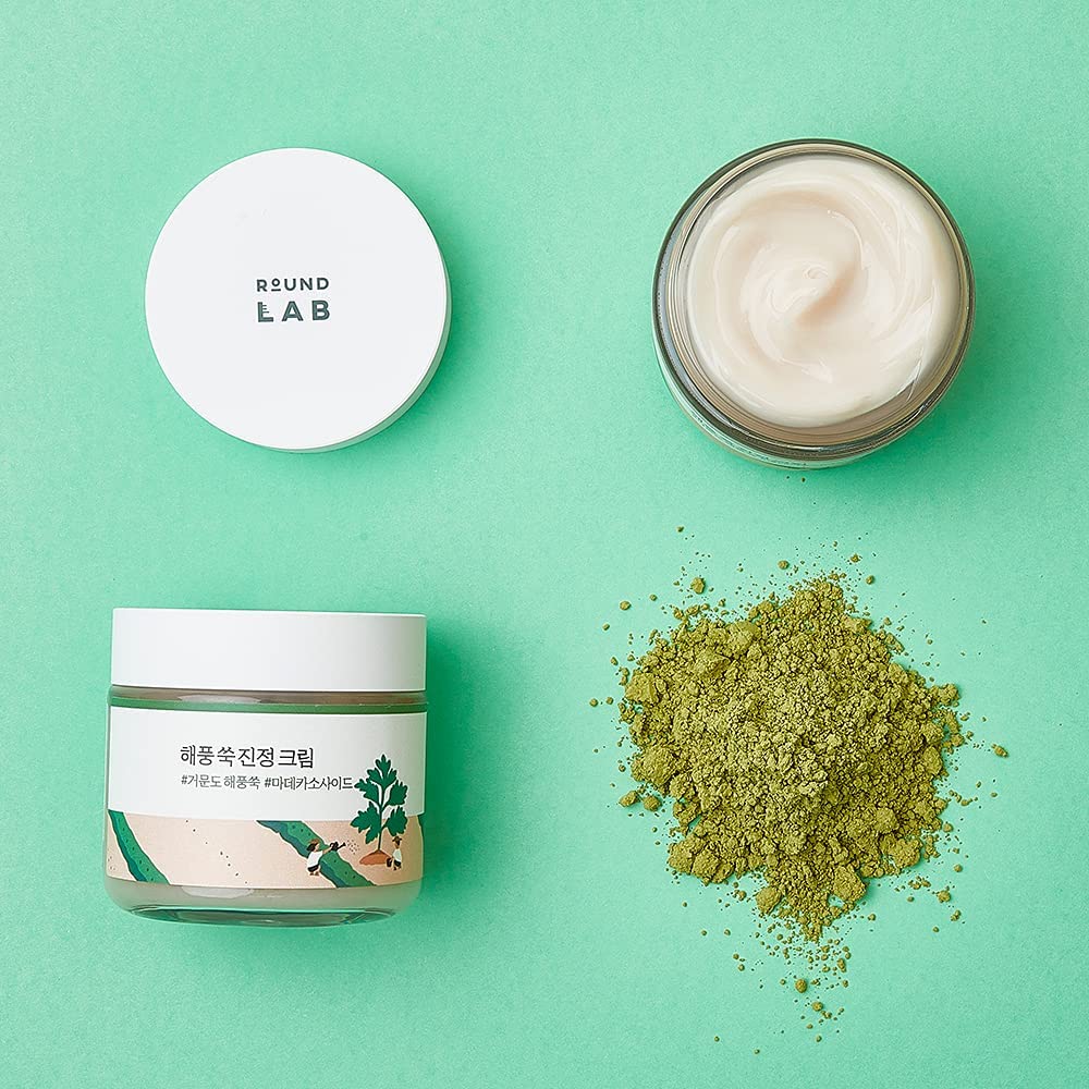 Round Lab Mugwort Calming Cream 80ml face moisturizer in a jar, designed to soothe and hydrate skin with natural herbal ingredients.