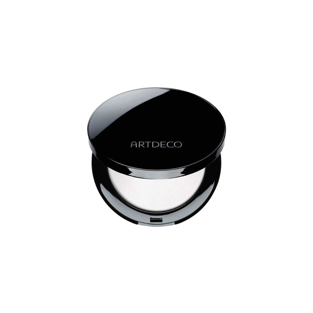 ARTDECO no color setting powder in a sleek compact, designed to set makeup with a matte finish and invisible appearance.