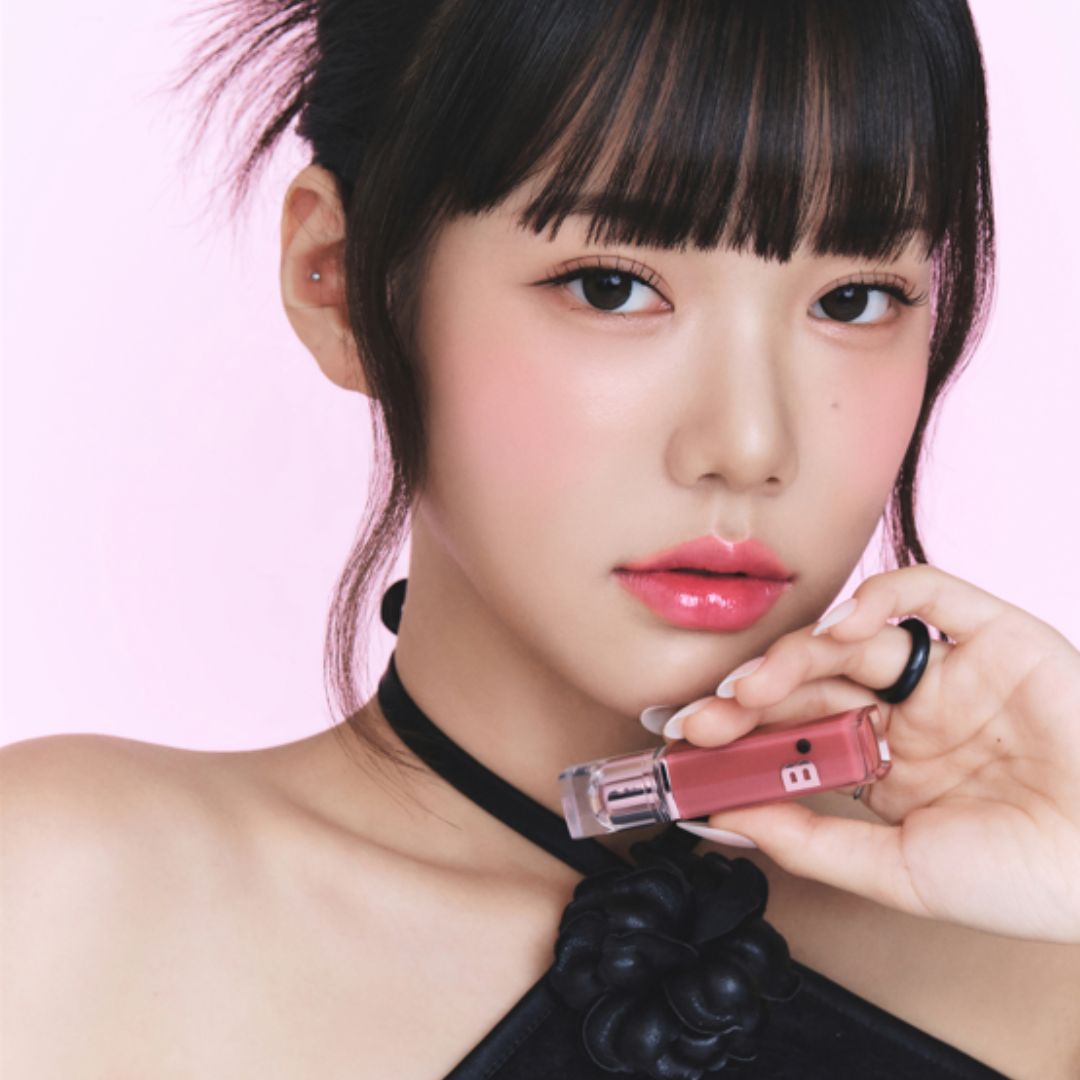 Banila Co Dew Glow Lip Tint in PK01 Pink Guava, showcasing a vibrant pink lip tint on smooth lips.