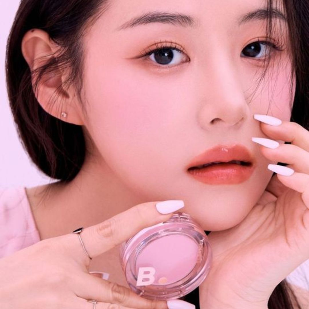 Banila Co B. By Banila Priming Veil Cheek blush in soft pink shade, applied on cheeks for a natural glow and subtle color.