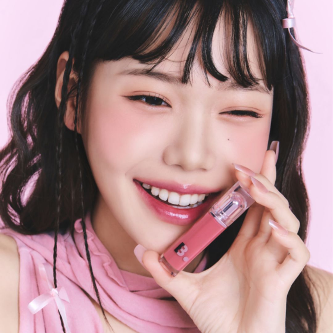 Banila Co Dew Glow Tint lip tint in Haze Mauve shade, showing a close-up of the tinted lips with a soft, natural finish.