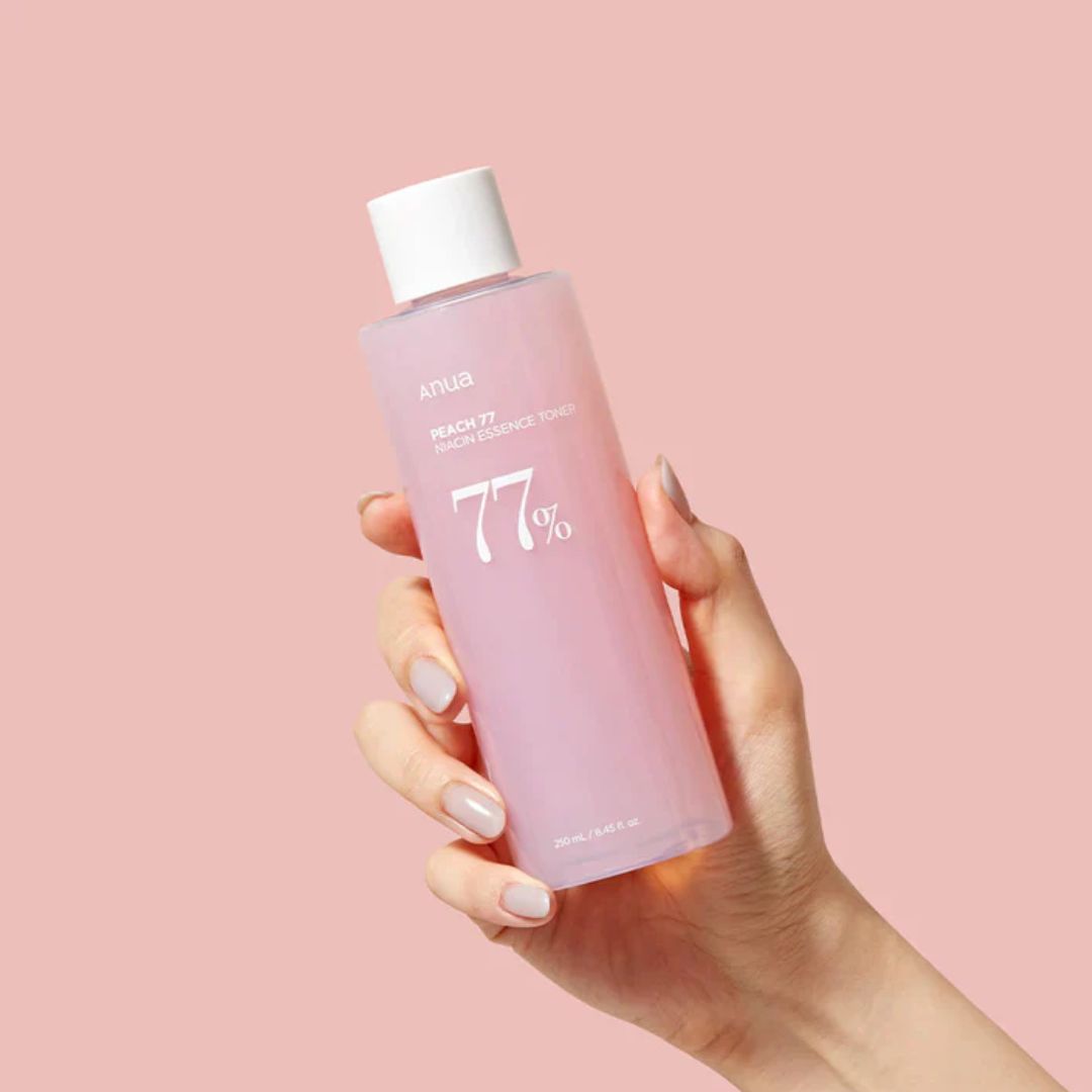 Anua Peach 77 Niacin Essence Toner bottle, 250ml, with peach and niacin ingredients, on a clean background.