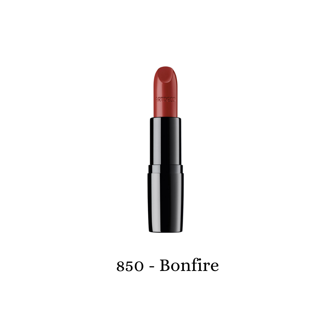 ARTDECO Perfect Color Lipstick in bonfire shade, showing a vibrant red lipstick with a sleek black bullet and glossy finish.